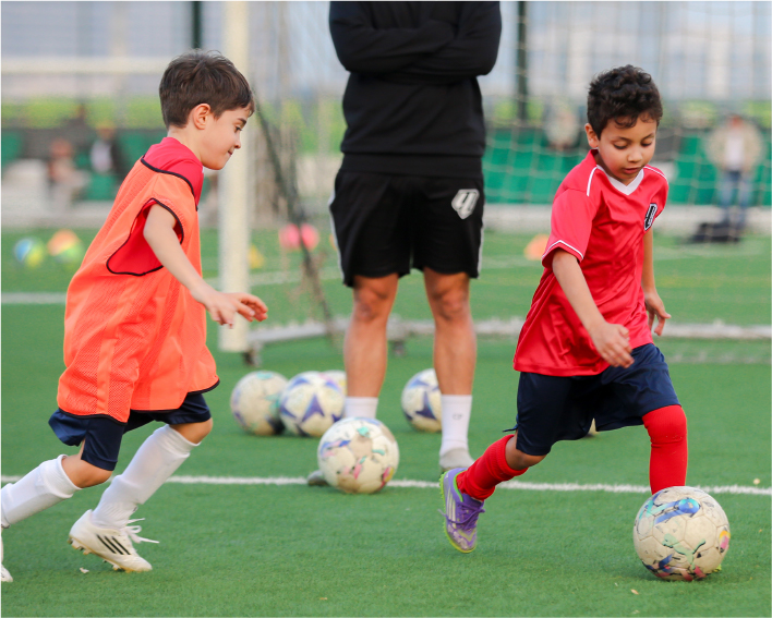 Young players training on a football pitch